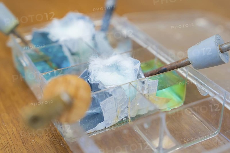 Close-up of electrodes and wires in a bowl of liquid, Battery Research, Nagold, Germany