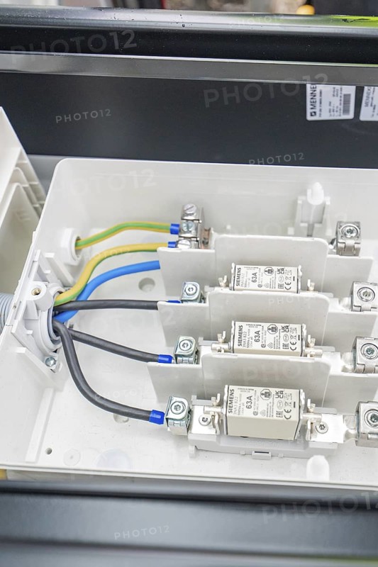 Close-up of an electrical switch box with built-in fuses and cables, installation of a charging station for electric cars, Calw, Germany
