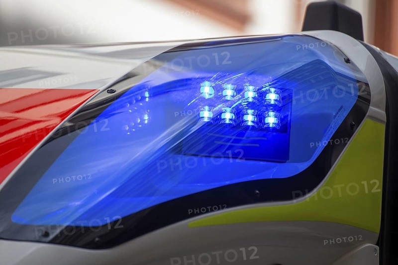 Close-up of a flashing blue light on an ambulance
