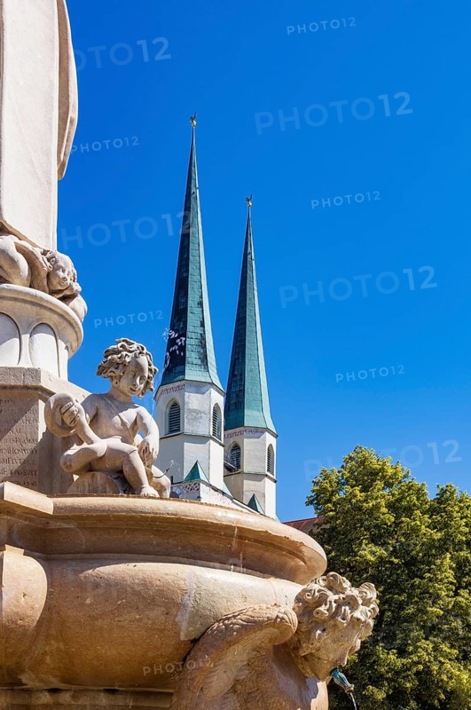 Marienbrunnen fountain on Kapellplatz with St.Philippus and Jakobus collegiate parish church, place of pilgrimage, Altötting, Upper Bavaria, Bavaria, Germany