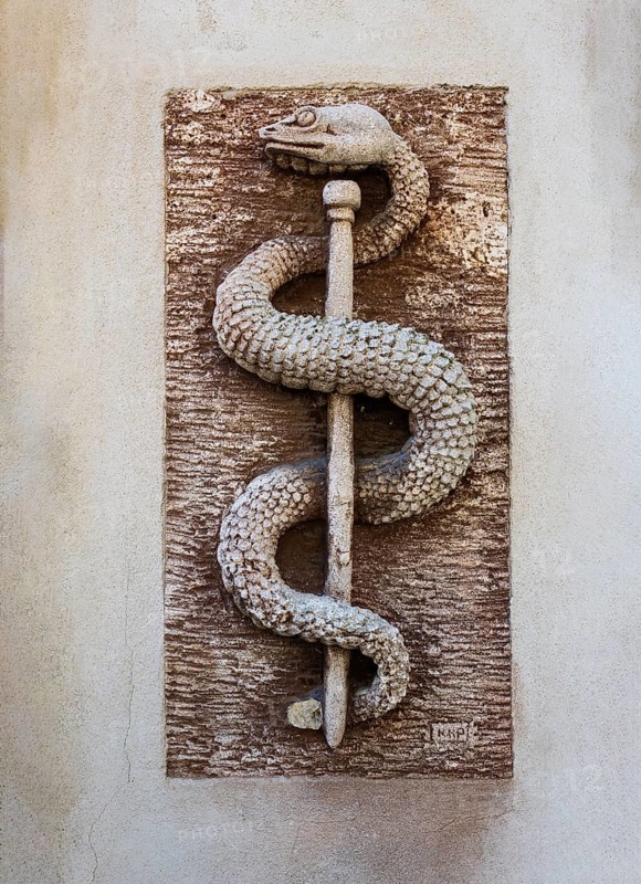 Aesculapian staff, apothecary symbol on a house wall, place of pilgrimage, Altötting, Upper Bavaria, Bavaria, Germany