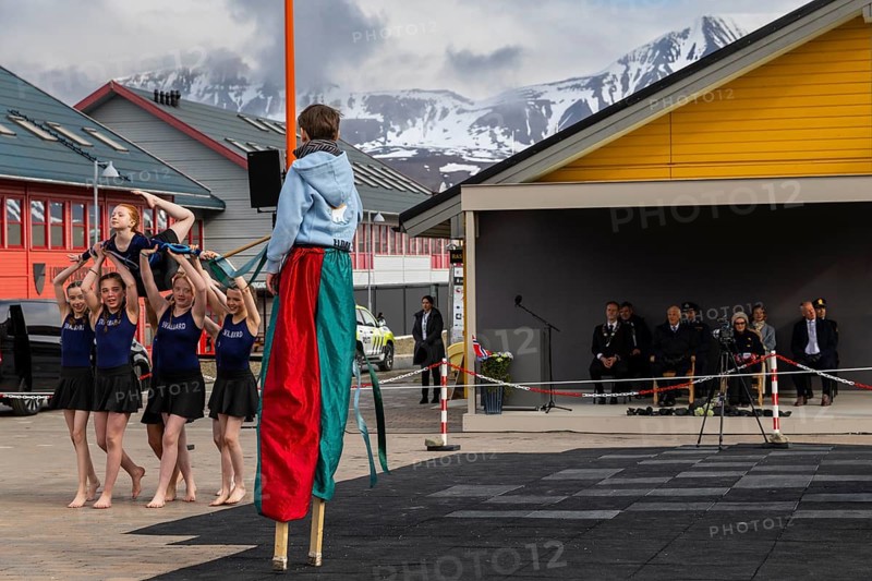 Children's group performing gymnastics at the reception for King Harald at the end of coal mining, portrait, Longyearbyen, Spitsbergen