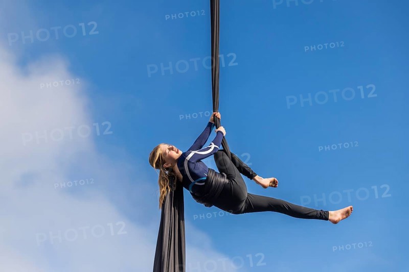 Aerial acrobatics, girls, catch for King Harald as part of the end of coal mining, Longyearbyen, Spitsbergen