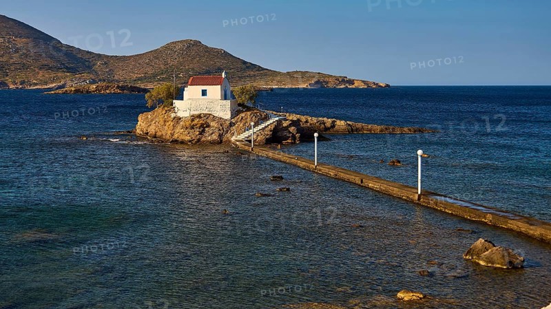 Calm scene with chapel on rocks in the sea under morning light, chapel, church, Agios Isidoros, rocky islet, Bay of Gourna, Kokkali, Leros, Dodecanese, Greek Islands, Greece