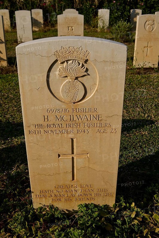 An inscribed gravestone with an emblem and carefully engraved text, surrounded by lawn, Military Cemetery, Commonwealth War Cemetery, Military Cemetery, WW2, 1939-1945, 179 graves, Alinda, Leros, Dodecanese, Greek Islands, Greece