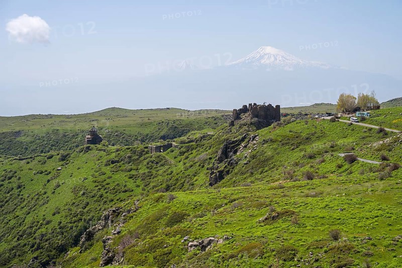 Ruins in green landscape with majestic mountain in background, Amberd Fortress and Mother of God Church with Ararat, Vahramashen Church, Vahramashen Surp Astvatsatsin, Amberd Church, Aragazotn Province, Armenia