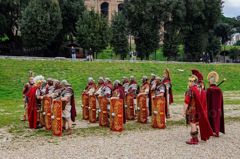 Traditional group of Roman legionaries soldiers lining up with large shield and swords next to Centurion Centurion, Circus Maximus, Rome, Italy