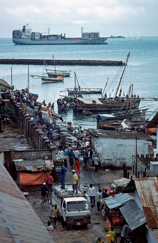 Hustle and bustle in the harbor, container ship, Zanzibar, Tanzania, Africa, June 2000, vintage, retro, old, historic