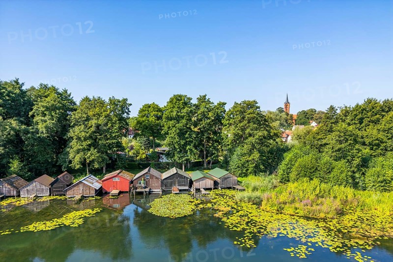 Aerial view, drone photo: house lake with city church and colorful boathouses on stilts, Feldberg, Feldberg Lake District, Mecklenburg-Western Pomerania, Germany