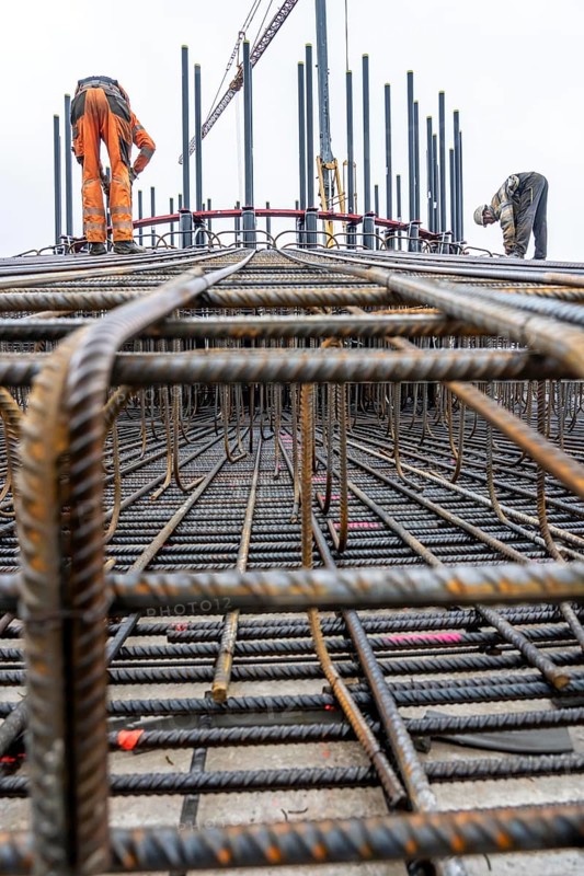 Assembly of reinforcing steel for the reinforced concrete foundation of a wind turbine, a mesh of rebar and rebar mesh, over 100 tons of reinforcing steel were used, the wind turbine will have a hub height of 160 meters, part of a new wind farm in Sauerland, near Balve, North Rhine-Westphalia, Germany