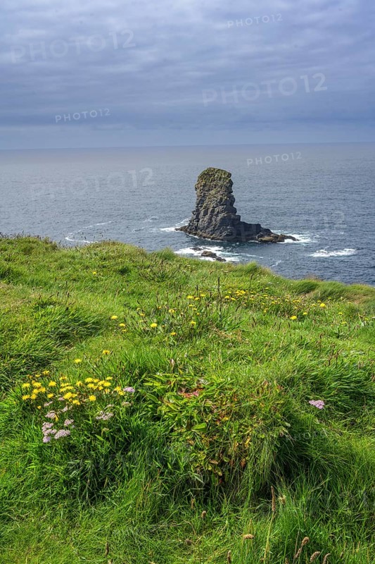 Rock nose in the sea called Candle Stick, Kilkee, County Clare, Ireland