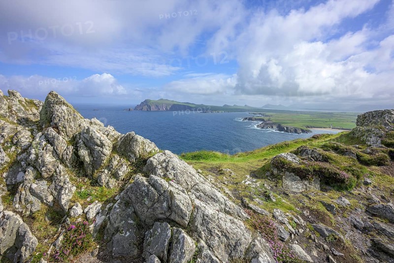 Coast with cliffs in the background An TriÃºr DeirfÃ©ar (The Three Sisters) from Clogher Head, Clogher, Kerry, Ireland