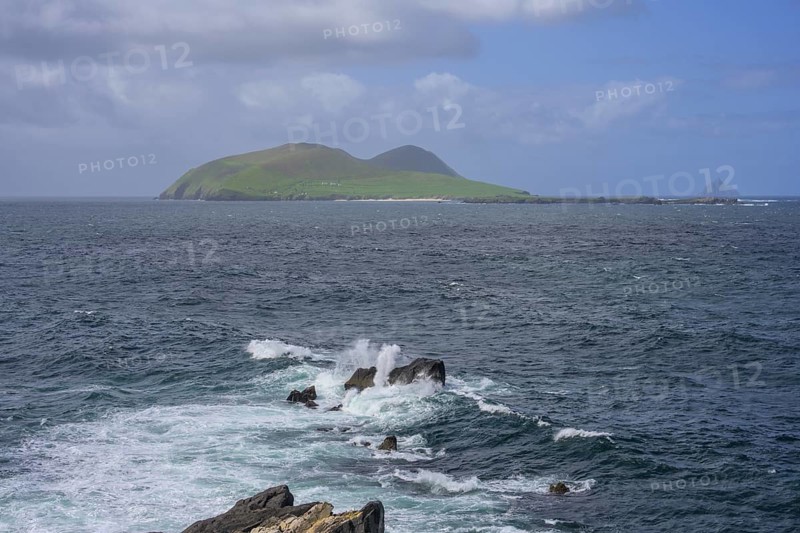 Waves blaze against rocks in the background Great Blasket Island, Blasket Center Viewing Platform, Dunurlin, Kerry, Ireland