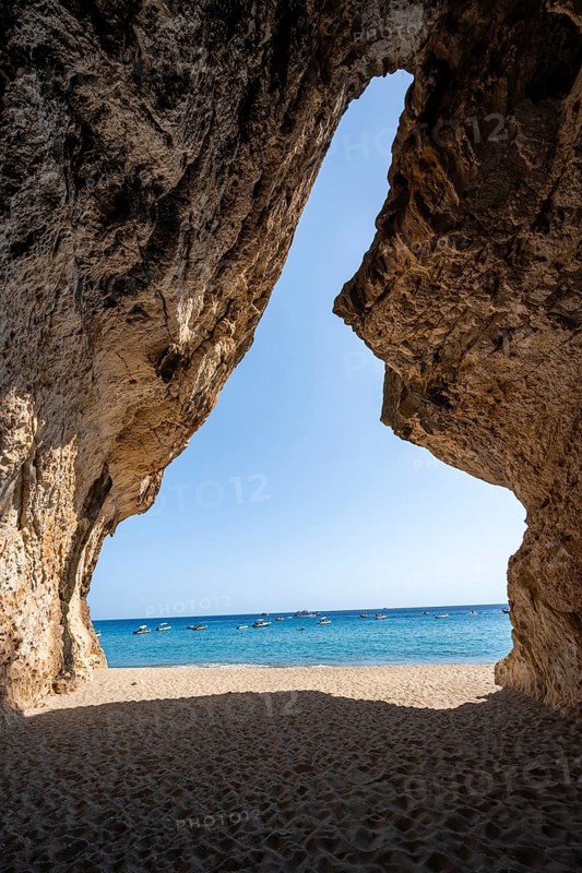 Rock cave on the beach at Cala Luna, Golfo di Orosei, Baunei, Sardinia, Italy