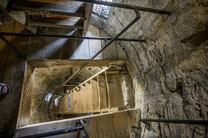 Steep wooden stairs in the round tower, St. Canice's Cathedral, Kilkenny, County Kilkenny, Ireland