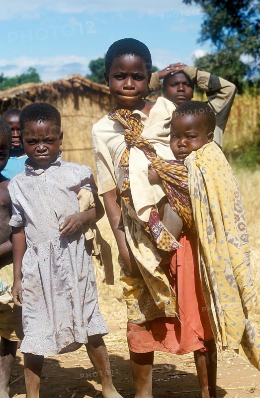 Children posing for the camera on the side of the road, Bwangu Mzimba, Malawi, Africa, June 2000, vintage, retro, old, historical