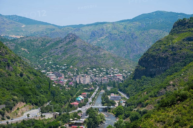 Mountain landscape with a town in the valley surrounded by lush greenery and a river flowing through it, Alaverdi, Alaverdi, Debed River, Lorikeet Province, Armenia