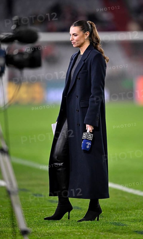 DAZN presenter Laura Wontorra with microphone, logo, Champions League, Allianz Arena, Munich, Bavaria, Germany