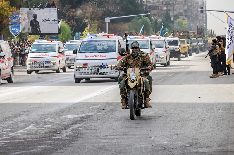 Damascus, Syria â€“ December 08, 2025: A military parade by Syrian army units marking the first anniversary of liberation and the change of Assad's regime, held in Umayyad Square in central Damascus, attended by thousands of people, Damascus, Damascus, Syria