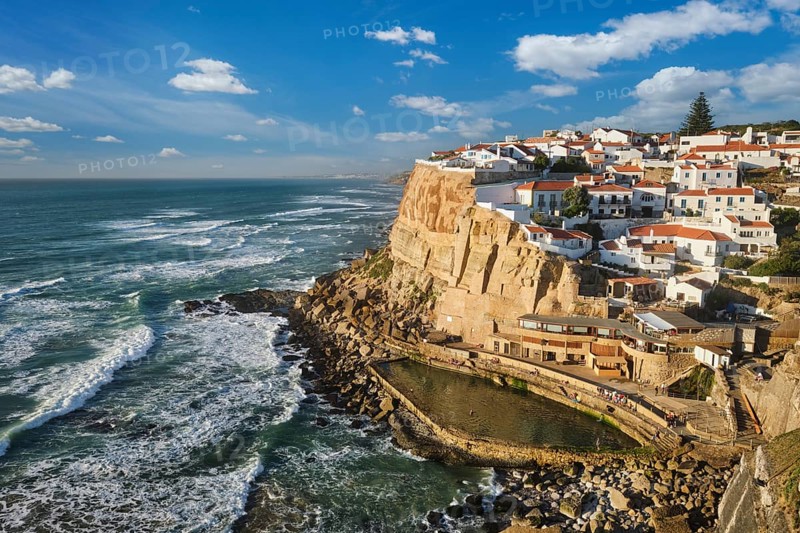 Scenic view of the seaside Azenhas do Mar fishing village on cliff on Atlantic ocean coast, Portugal