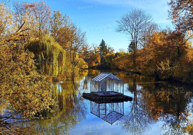 The river Lippe in GrÃ¼nen Winkel with the artwork Arche by Christoph Hildebrand, Lichtpromenade Lippstadt, North Rhine-Westphalia, Germany