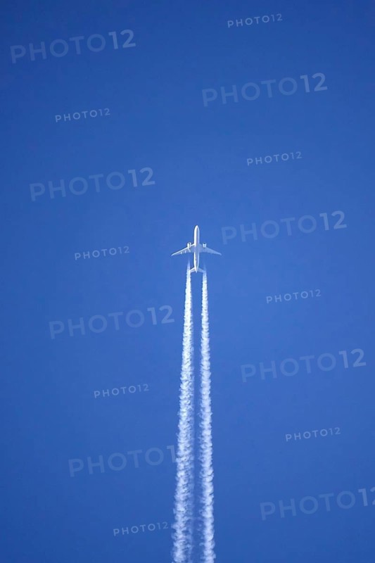 Airplane with contrails, Germany