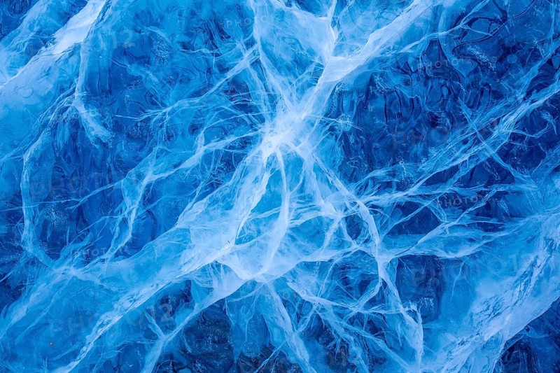 Close-up of blue ice, made of compressed snow, structure showing cracks and fissures inside glacier, Spitsbergen / Svalbard, Norway