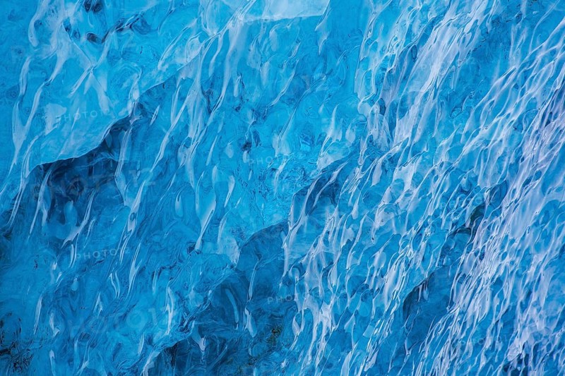 Close-up of compressed, smooth melting blue ice structure inside glacier, Spitsbergen / Svalbard, Norway