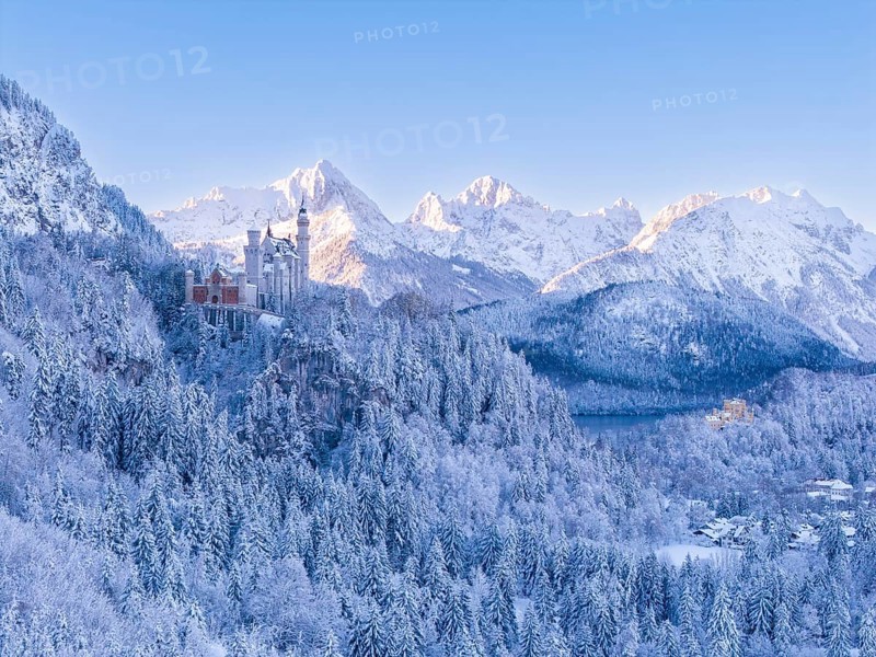 View of Neuschwanstein Castle in a vast, snowy mountain landscape. Impressive winter panorama, Schwangau near FÃ¼ssen, OstallgÃ¤u, AllgÃ¤u, Bavaria, Germany