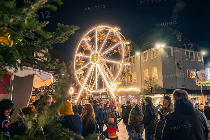 Lively Christmas market with brightly lit Ferris wheel, Christmas market 2025, Nagold, Black Forest, Calw district, Germany