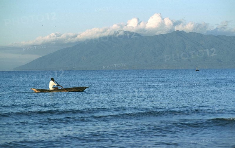 Man in dugout, Malawi Sea, Kande, Malawi, Africa, July 2000, vintage, retro, old, historic