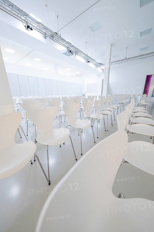 Modern, empty conference room with white chairs in minimalist design, Open Horizons exhibition, Schauwerk Sindelfingen, BÃ¶blingen district, Germany