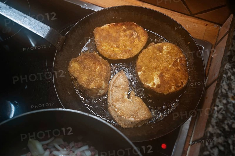 Breaded schnitzel of giant bovista (Bovista) in a pan, Mecklenburg-Vorpommern, Germany