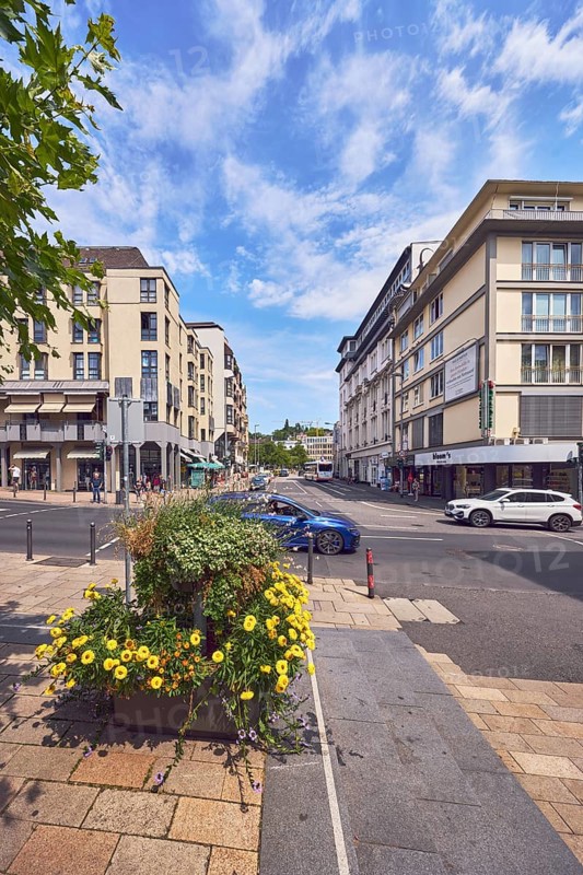 Pedestrian zone, residential and commercial buildings, general architecture, barrier bollard, alleyway, flower pots, cars, blue sky, cumulus clouds, cirrus clouds, Langgasse, Webergasse and Kranzplatz intersection, Wiesbaden, state capital, district-free city, Hesse, Germany