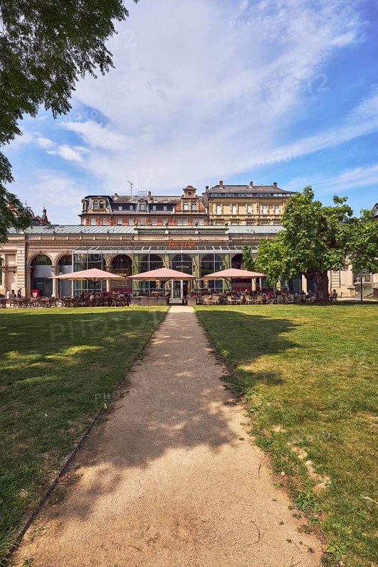 Café, system catering, Cafe Del Sol, historic building, hall, colonnades, parks, trees, lawn, paths, blue sky, cumulus clouds, cirrus clouds, Kochbrunnenplatz, Wiesbaden, state capital, district-free city, Hesse, Germany