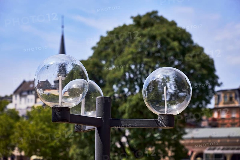 Lantern, church tower, trees, general architecture, depth of focus with blurred background, milky blue sky, diffuse light, Kochbrunnenplatz, Wiesbaden, state capital, district-free city, Hesse, Germany