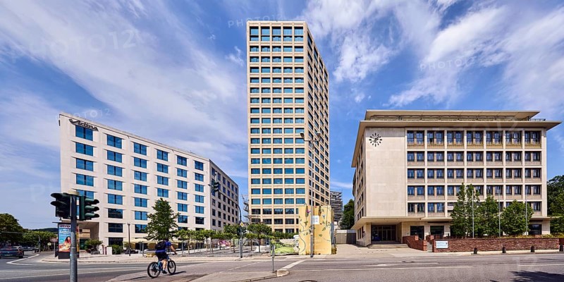Commercial building, high-rise building, general architecture, residential tower, Hessian Ministry of Labour, Integration, Youth and Social Affairs, Apartment Hotel Adina Hotels, lanes, road, trees, cyclists as a secondary theme, blue sky, altocumulus clouds, cirrus clouds, intersection between TaunusstraÃŸe, Cansteinsberg and Sonnenberger StraÃŸe, Wiesbaden, state capital, district-free city, Hesse, Germany