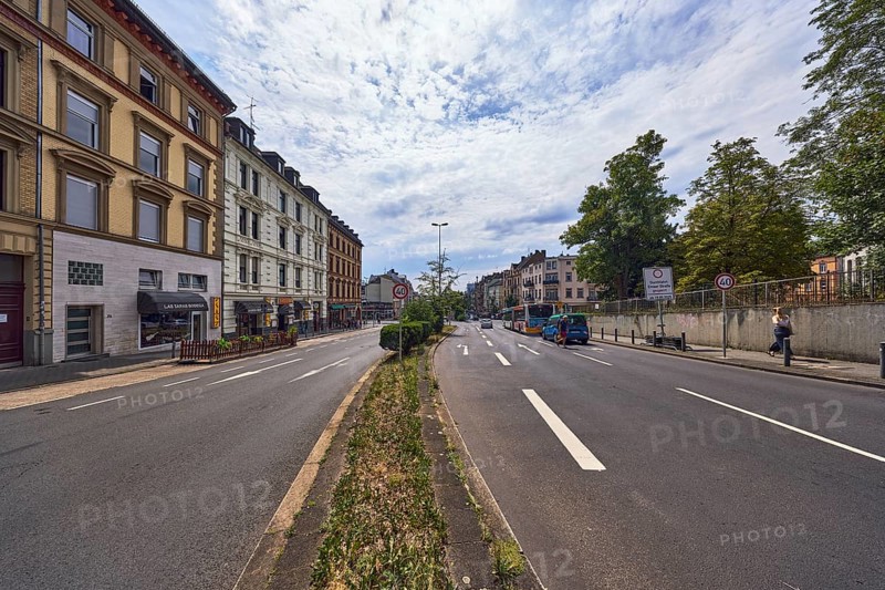 Buildings, residential and commercial buildings, general architecture, lanes, central island, road markings lanes, direction arrows, speed 40 sign, lantern, trees, meadow, back light, cloudy, blue sky, altocumulus clouds, Schwalbacher StraÃŸe, Wiesbaden, state capital, district-free city, Hesse, Germany