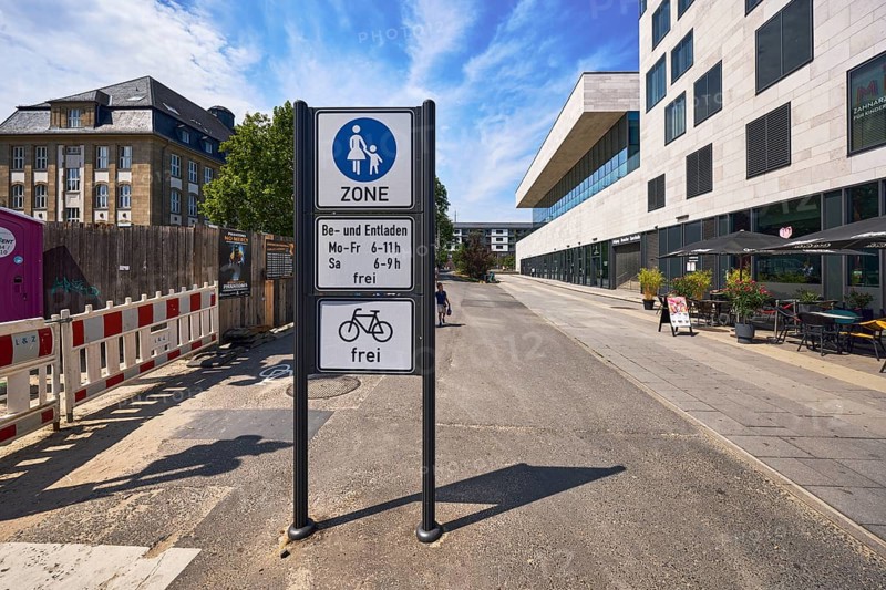 Pedestrian zone, traffic sign pedestrian zone with additional sign loading and unloading free and bicycles free, general architecture, houses, modern buildings, commercial buildings, fenced construction site, road construction, trees, blue sky, altocumulus clouds, cirrus clouds, Platz der Deutschen Einheit, Wiesbaden, state capital, district-free city, Hesse, Germany