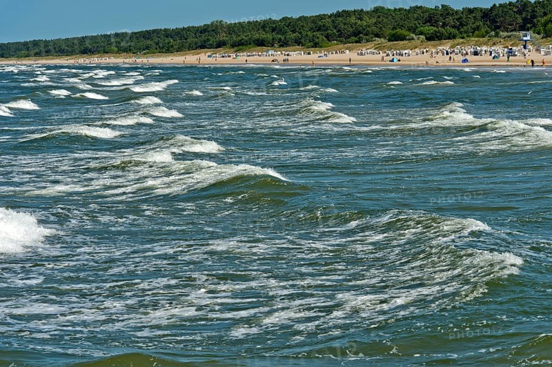 Play of Baltic Sea waves on the beach of the seaside resort of Ahlbeck, Usedom island, Mecklenburg-Western Pomerania, Germany