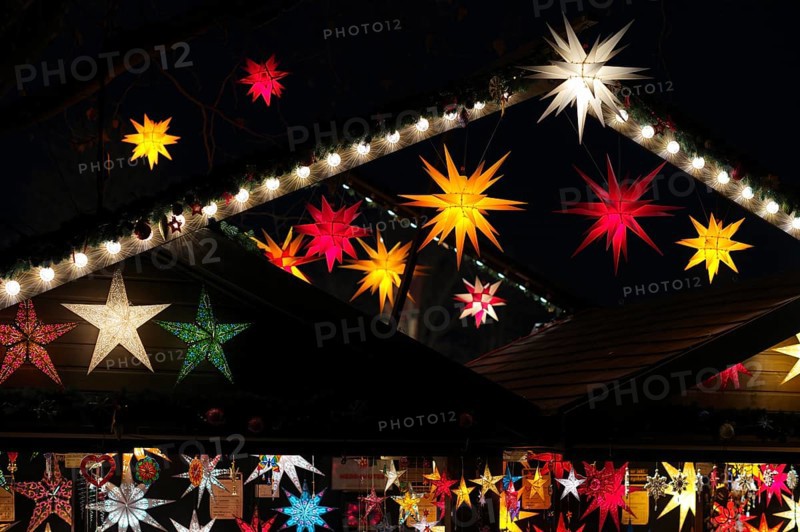 Night shot, sales stand for poinsettias glowing stars, decoration, Christmas stalls, Christmas market, blue hour, Stuttgart, Baden-WÃ¼rttemberg, Germany