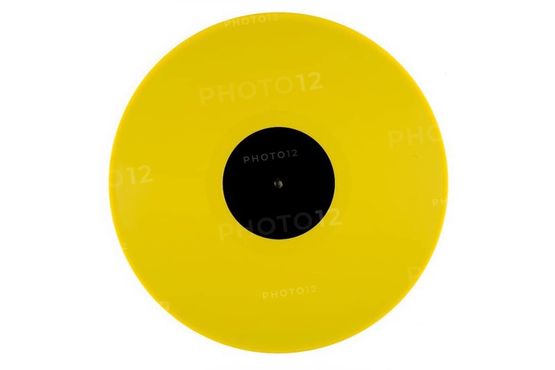 Light yellow phonograph record with a black label in the middle on a white background