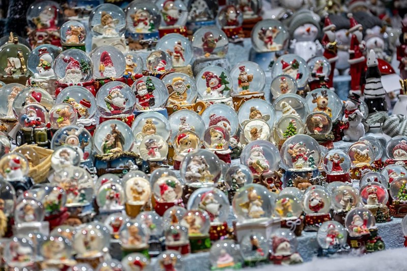 Christmas market, sales stand for decorative items, snow globes with Christmas motifs, North Rhine-Westphalia, Germany