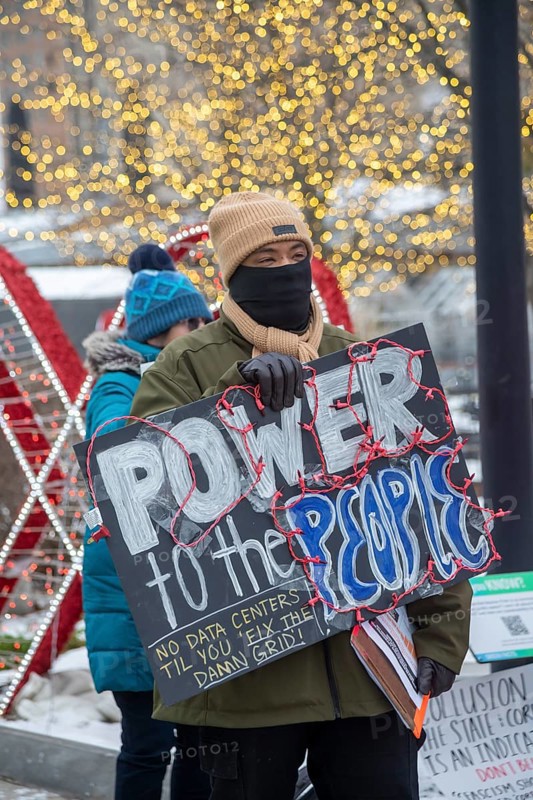 Detroit, Michigan - Residents picket DTE Energy, opposing the electric utility's plan to provide power for a proposed $7 billion data center in rural Michigan. They fear that it could raise residential electricity rates and endanger the water supply