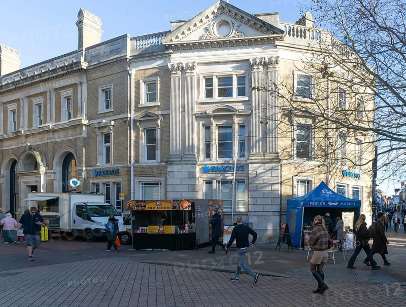 Barclays Bank building food stalls Princes street pedestrianised area, town centre of Ipswich, Suffolk, England, UK