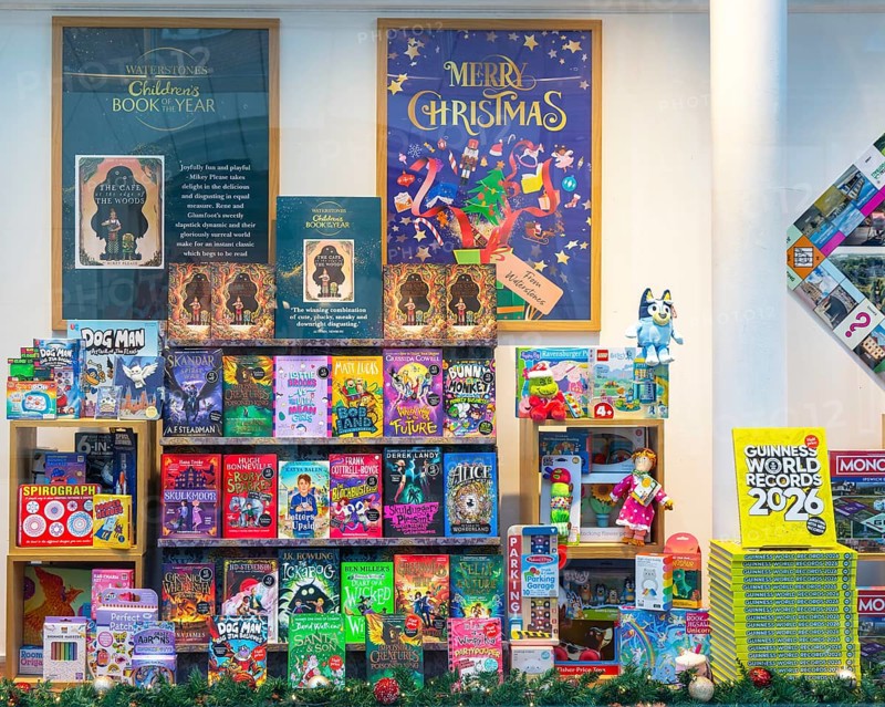 Children's books in window display of Waterstones bookshop, Ipswich, Suffolk, England, UK
