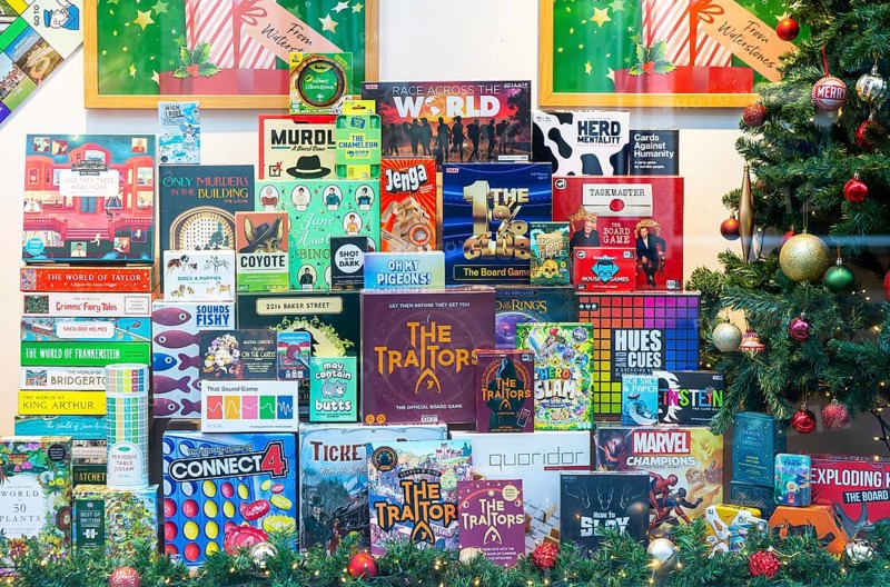 Boardgames in window display of Waterstones bookshop, Ipswich, Suffolk, England, UK