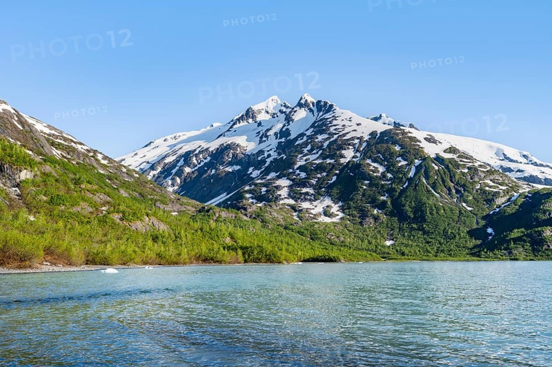 Snowy mountains on glacial lake Portage Lake, Chugach National Forest, Alaska, USA