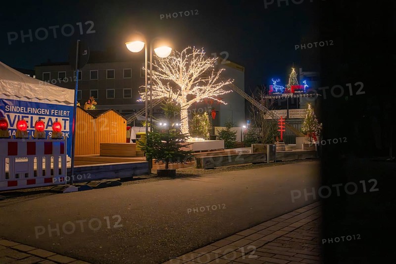 Atmospheric Christmas market at night with illuminated trees and stands, Sindelfingen, Böblingen district, Germany