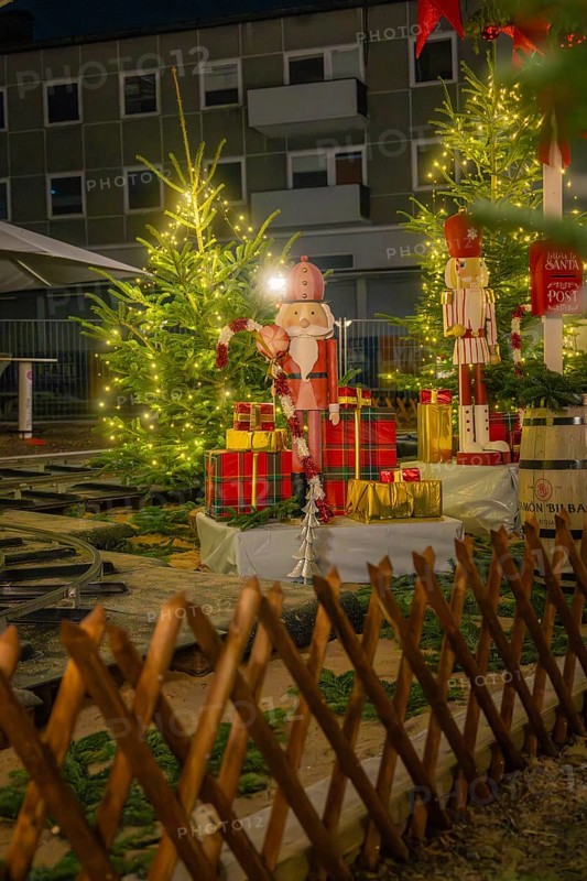 Christmas decorations with gifts and fir trees, illuminated with festive lights, Sindelfingen, Böblingen district, Germany